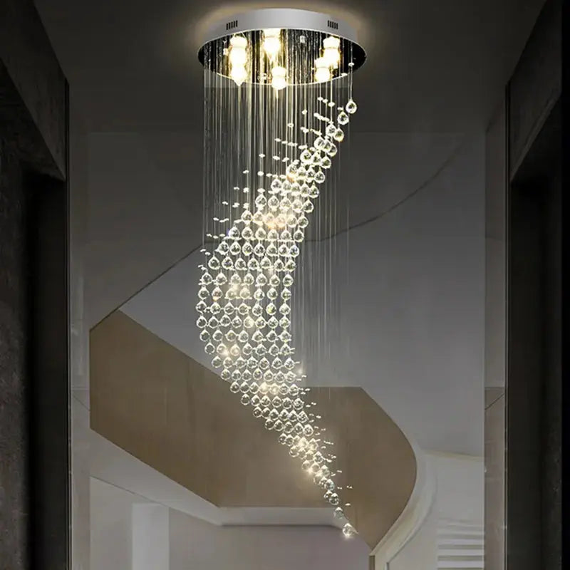 Raindrop crystal chandelier in tall foyer