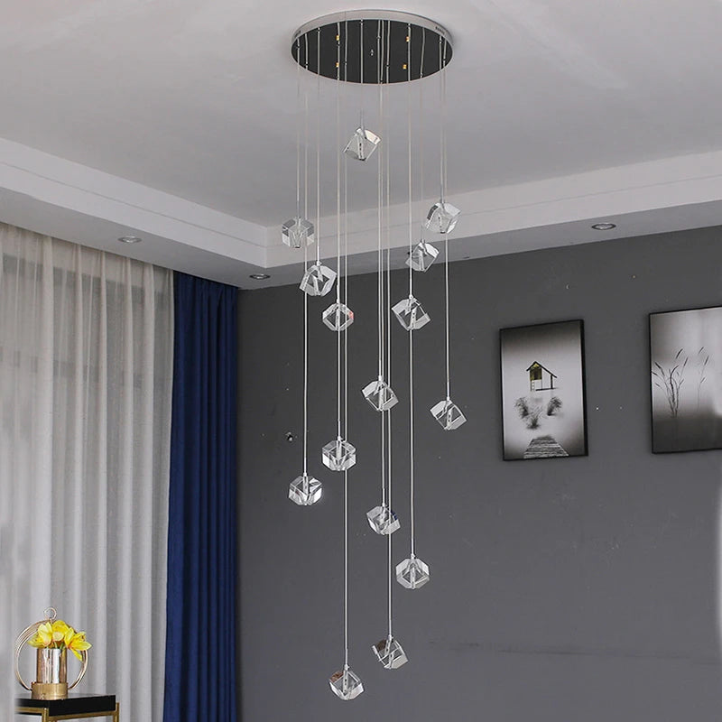 Modern crystal square chandelier over an entryway staircase