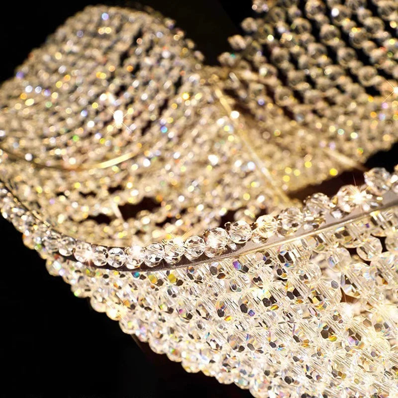 Modern Wave Crystal Chandelier Over Dining Table  Seus Lighting