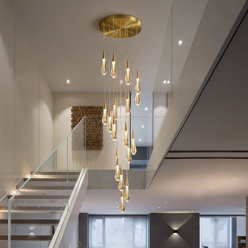 Spiral staircase chandelier installed view