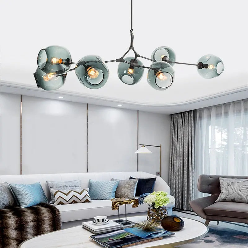 Lámpara de araña Zentra negra y dorada